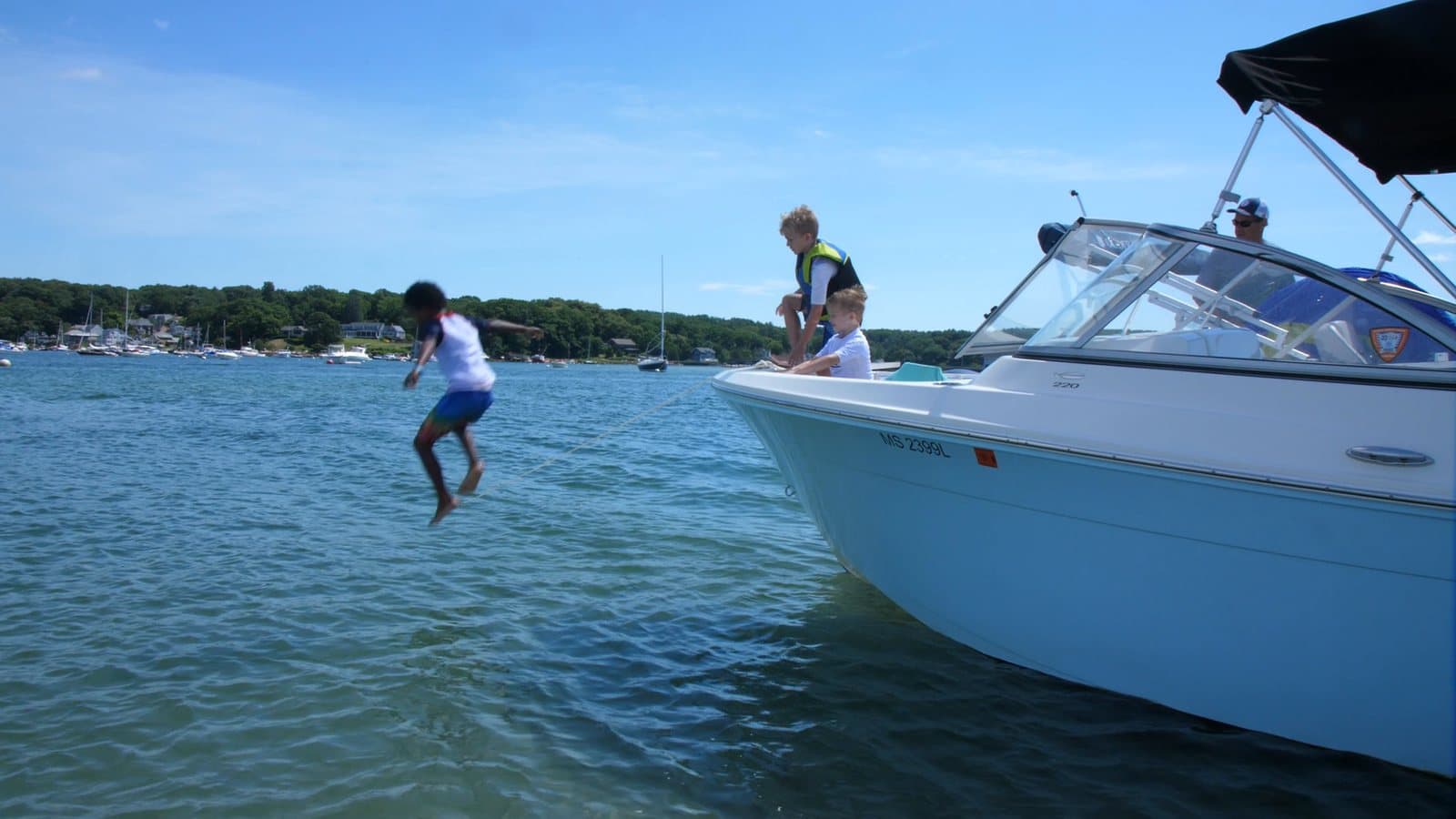 A Carefree Boat Club center console underway with members aboard on North Shore waters