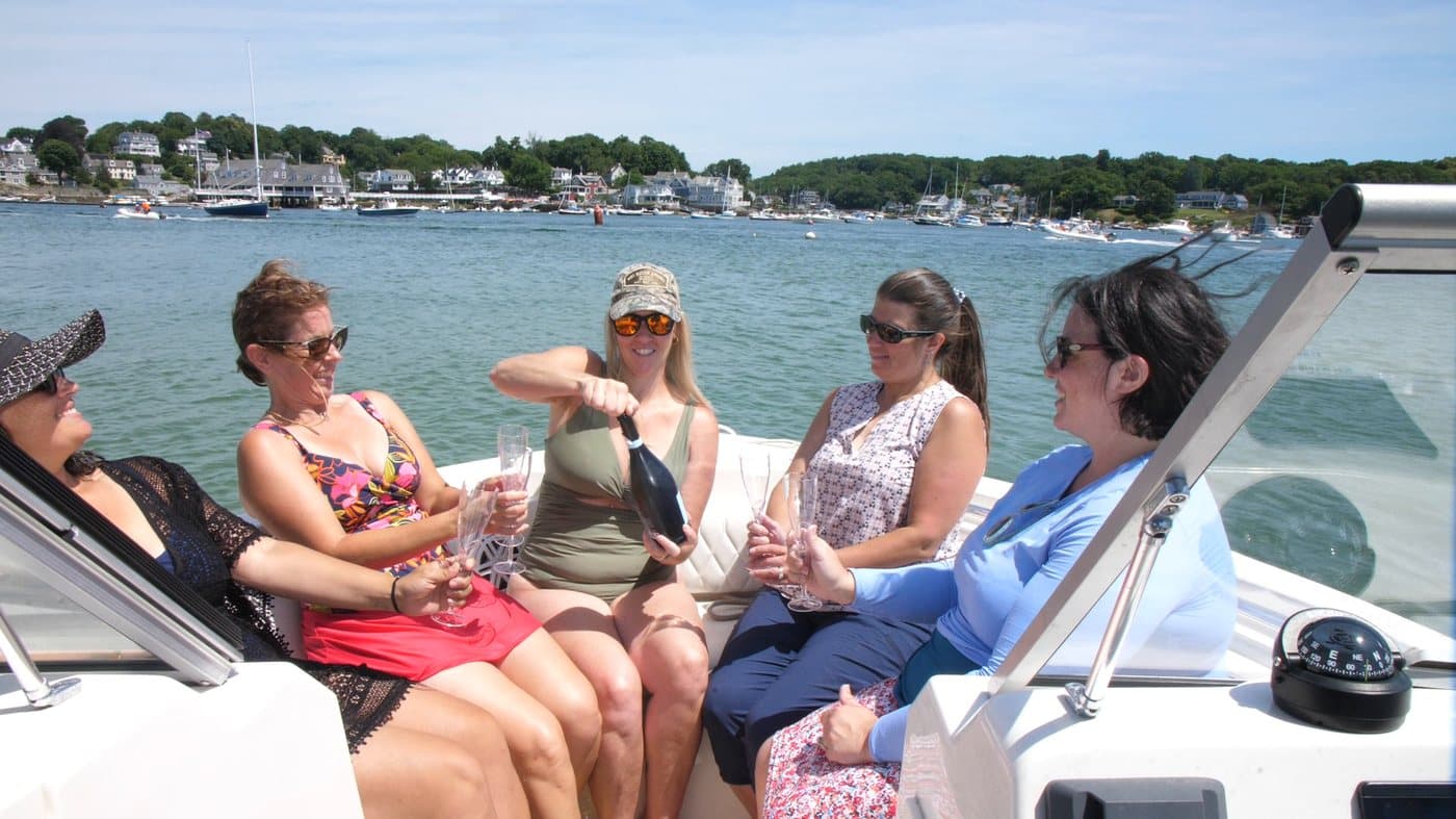 Kids enjoying treats aboard a Carefree Boat Club boat